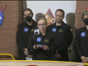 In this image made from video provided by NASA, Kelly Haston, a crew member of the first CHAPEA mission, speaks in front of other members, from left to right, Ross Brockwell, Nathan Jones, and Anca Selariu, Saturday, July 6, 2024, at Johnson Space Center in Houston, Texas. The crew of a NASA mission to Mars emerged from their craft after a yearlong voyage that never left Earth. The four volunteers crew members spent more than 12 months inside NASA&#039;s first simulated Mars environment at Johnson Space Center in Houston, coming out of the artificial alien environment Saturday.