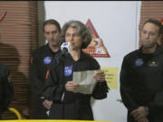 In this image made from video provided by NASA, Anca Selariu, a crew member of the first CHAPEA mission, speaks in front of other members, from left to right, Kelly Haston, Ross Brockwell, and Nathan Jones, Saturday, July 6, 2024, at Johnson Space Center in Houston, Texas. The crew of a NASA mission to Mars emerged from their craft after a yearlong voyage that never left Earth. The four volunteers crew members spent more than 12 months inside NASA&rsquo;s first simulated Mars environment at Johnson Space Center in Houston, coming out of the artificial alien environment Saturday.
