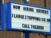 A hiring sign is displayed at a restaurant in Chicago, Thursday, June 27, 2024. On Thursday, July 11, 2024, the Labor Department reports on the number of people who applied for unemployment benefits last week. (AP Photo/Nam Y.