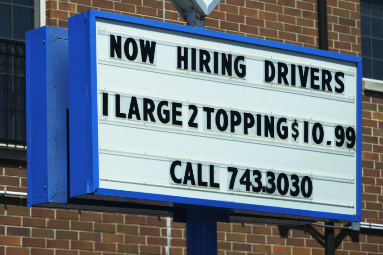 A hiring sign is displayed at a restaurant in Chicago, Thursday, June 27, 2024. On Thursday, July 11, 2024, the Labor Department reports on the number of people who applied for unemployment benefits last week. (AP Photo/Nam Y.