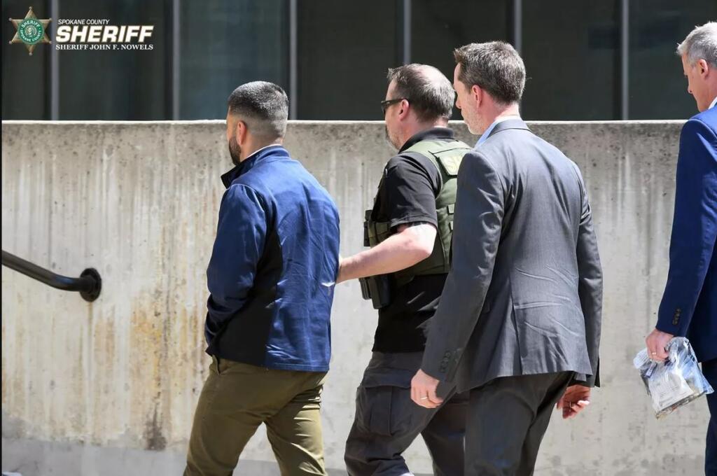 Wahid Kashify is brought to the Spokane County Jail on July 18 after awaiting extradition in the Netherlands for two years for the killing of his wife.