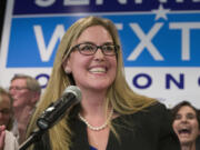 FILE - Democrat Jennifer Wexton speaks at her election night party after defeating Rep. Barbara Comstock, R-Va., Tuesday, Nov. 6, 2018, in Dulles, Va. A rare neurological disease robbed Wexton of her ability to speak clearly. But with the help of a powerful artificial intelligence program, the Virginia Democrat will use a clone of her voice to deliver what is believed to be the first speech on the House floor ever given via a voice cloned by artificial intelligence, thrusting Wexton into a broader debate about over artificial intelligence.