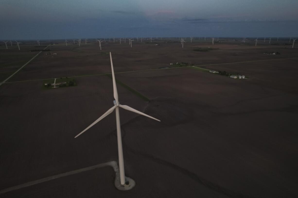 Wind turbines operate, Tuesday, May 7, 2024, in Paxton, Ill. (AP Photo/Joshua A.