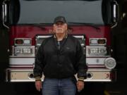 Fire Chief Denny Kingren poses for a portrait, Thursday, May 9, 2024, at the Paxton Volunteer Fire Department, in Paxton, Ill. Local officials and school superintendents, fire chiefs and community college administrators are often among the first to see the economic benefits of wind development. &ldquo;It was a true benefit to our fire department,&rdquo; Kingren said. (AP Photo/Joshua A.