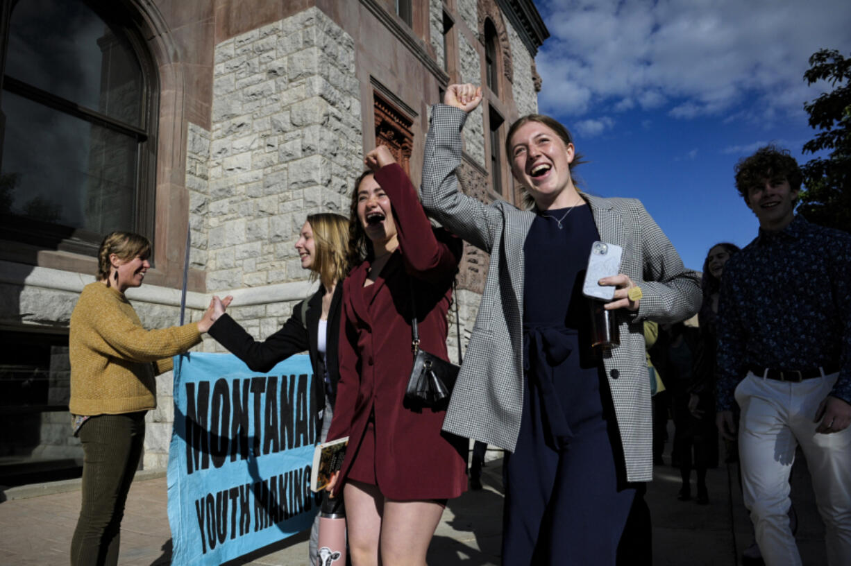 FILE - Youth plaintiffs in the climate change lawsuit, Held vs. Montana, arrive at the Lewis and Clark County Courthouse, June 20, 2023, in Helena, Mont., for the final day of the trial. A Montana judge in August 2023 sided with young environmental activists who said state agencies were violating their constitutional right to a clean and healthful environment by permitting fossil fuel development without considering its effect on the climate. The state&rsquo;s effort to overturn the ruling is now before the Montana Supreme Court.