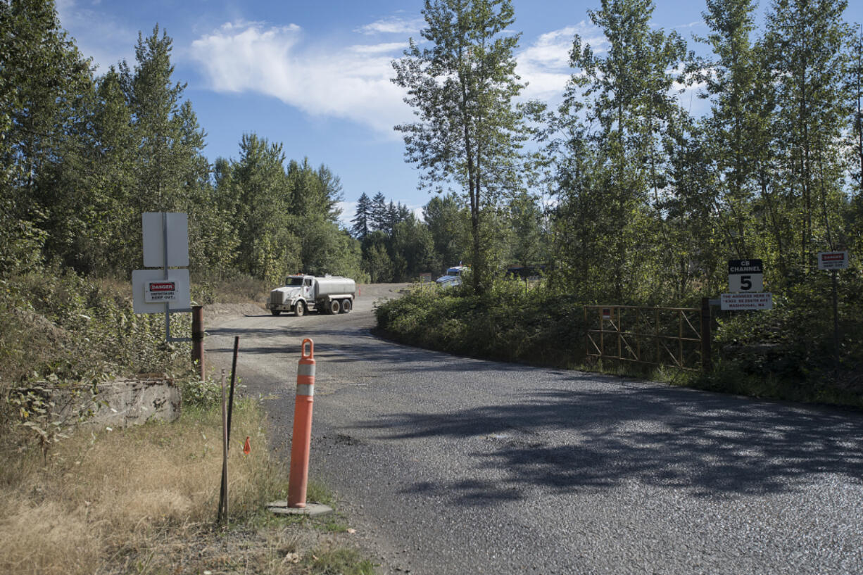 A truck prepares to leave the Zimmerly gravel pit near Washougal in 2018. The Clark County Council voted against a request by Zimmerly to convert the private road into a public road.