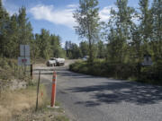 A truck prepares to leave the Zimmerly gravel pit near Washougal in 2018. The Clark County Council voted against a request by Zimmerly to convert the private road into a public road.