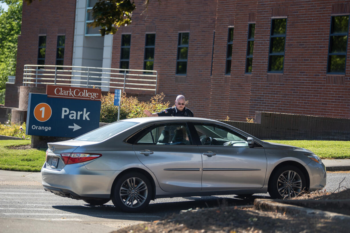 A driver is turned around while trying to enter Clark College on May 14 following reports of a stabbing on campus. An internal review of the incident found that Clark College had several deficiencies in its campus emergency response system.