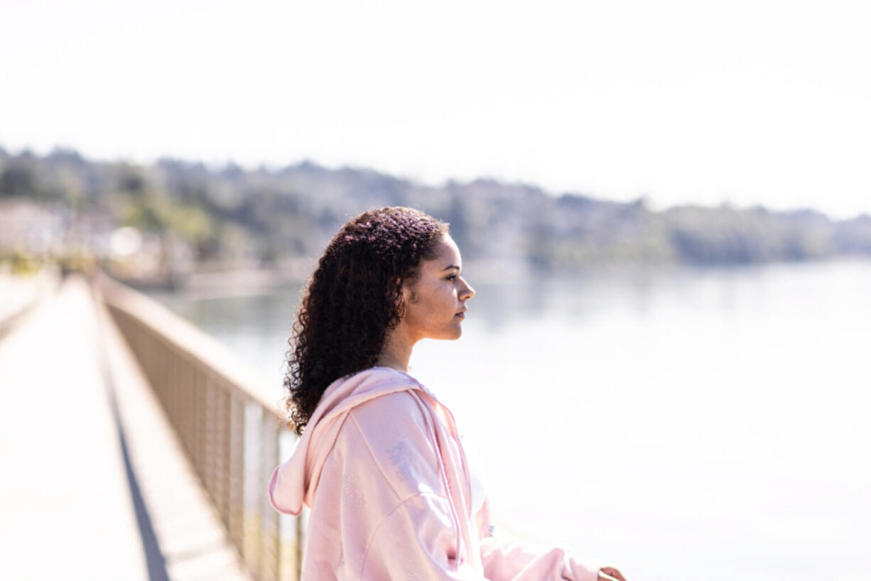 Hannah Power, 18, is photographed at Redondo Park near her home in Federal Way, Wash. on Tuesday, July 16, 2024. Power was commercially sexually exploited by a man she met on Tinder in June 2022, when she was 16. The man met her in a hotel in Lynnwood and had her perform on Chaturbate, a popular online platform with uncensored live webcam shows. After that night, Hannah decided to drop out of high school and has been struggling with depression and anxiety stemming from the exploitation.