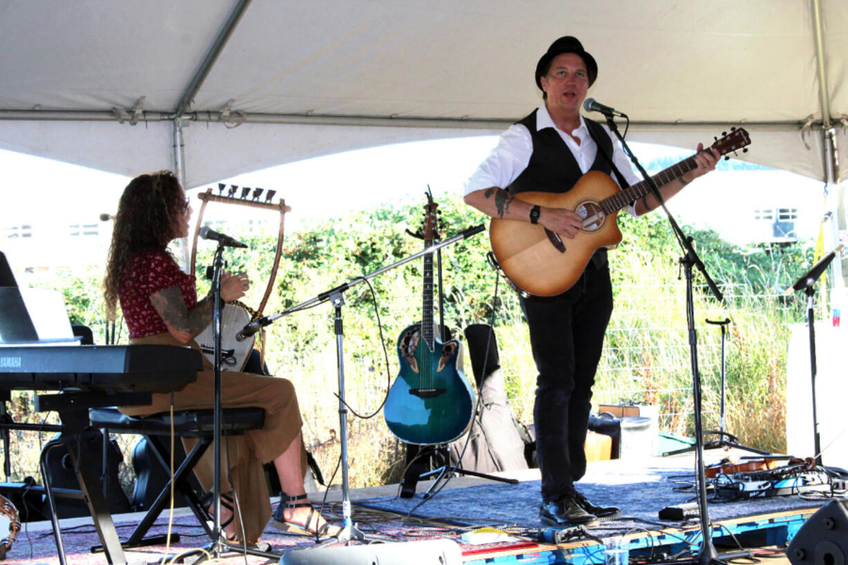 Folk duo Raven Fables performs at the 2023 Washougal Songcraft Festival. Raven Fables consists of Stephanie Corbell and husband Christopher, co-founders of the festival.