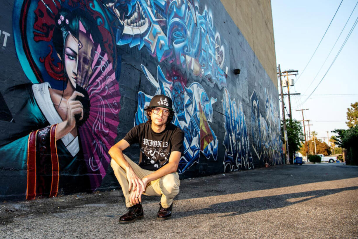 On Sept. 30, 2020, L.A. Taco editor Javier Cabral in the alleyway behind the Figueroa Theatre in Los Angeles.