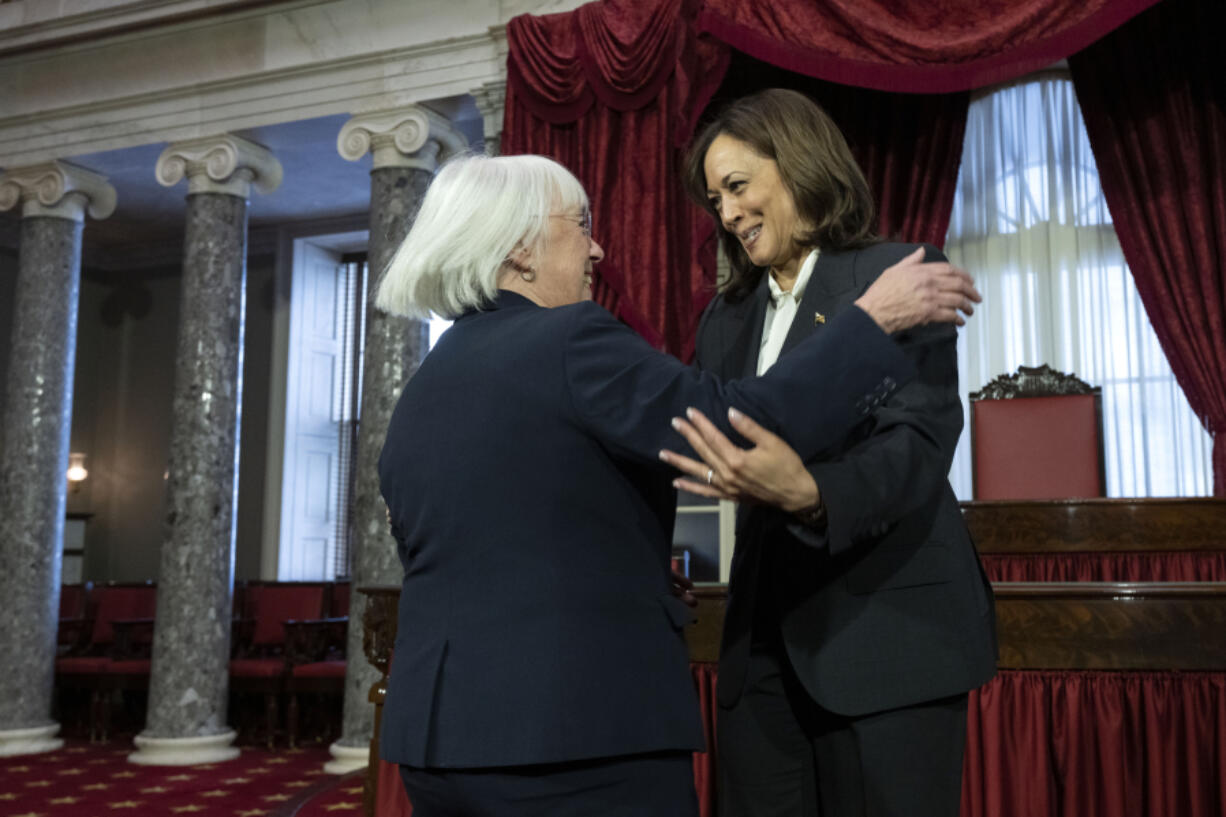 Vice President Kamala Harris and Sen. Patty Murray, D-Wash., hug as Murray arrives for her ceremonial swearing-in, at the Old Senate Chamber on Capitol Hill in Washington, Tuesday, Jan. 3, 2023.