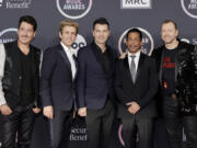 From left, Jonathan Knight, Joey McIntyre, Jordan Knight, Danny Wood and Donnie Wahlberg of New Kids on the Block attend the 2021 American Music Awards at Microsoft Theater on Nov. 21, 2021, in Los Angeles.