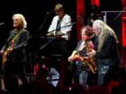 Daryl Hall (left) and John Oates (center) with saxophonist Charles DeChant during a performance at the HoagieNation festival in 2021.