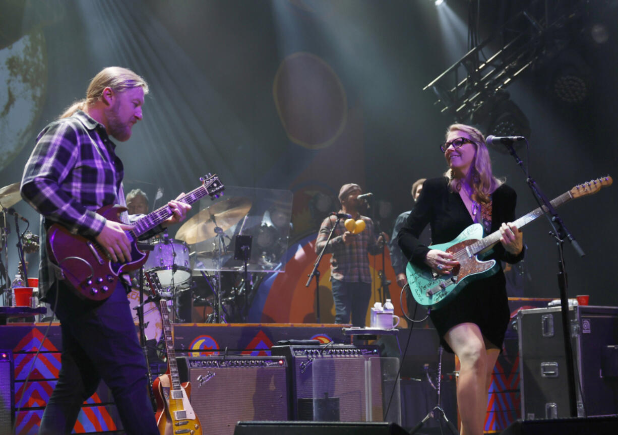 Derek Trucks, left, and Susan Tedeschi of the Tedeschi Trucks Band perform Feb. 23, 2023, at the Ryman Auditorium on in Nashville, Tenn.