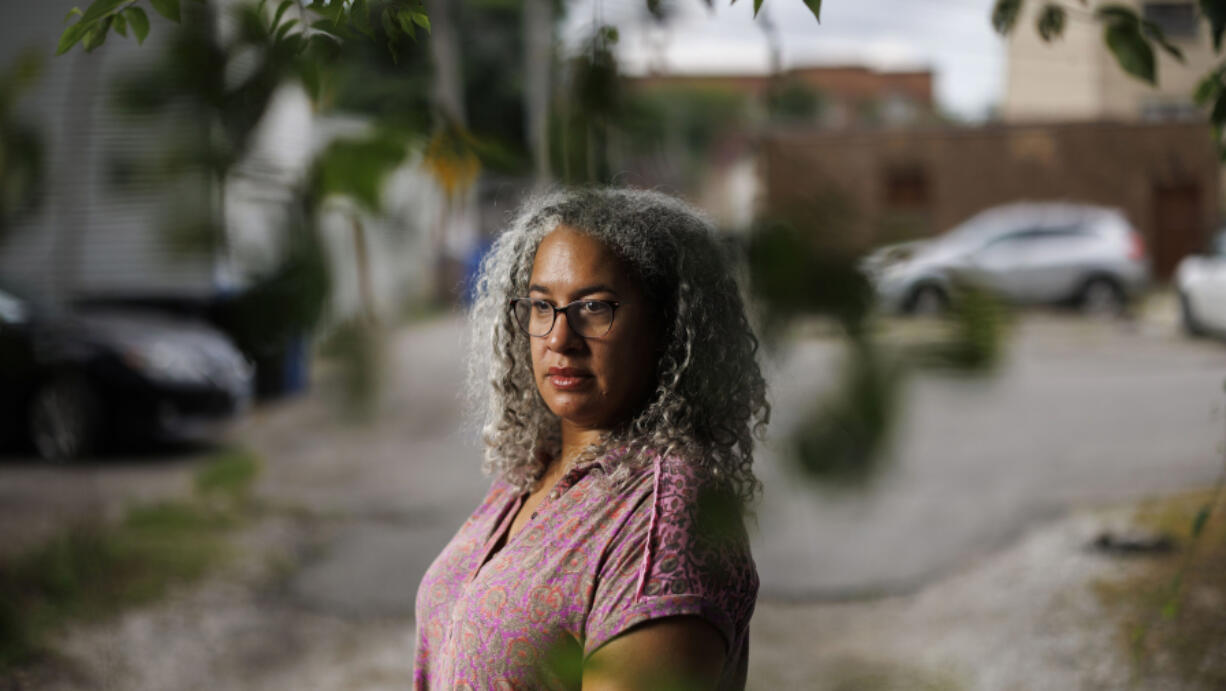 Jennifer Leigh Husbands, 51, is shown near her home Aug. 1 in Chicago. Husbands is Caribbean American; her mother is from Michigan and her father is from Barbados. (Armando L.