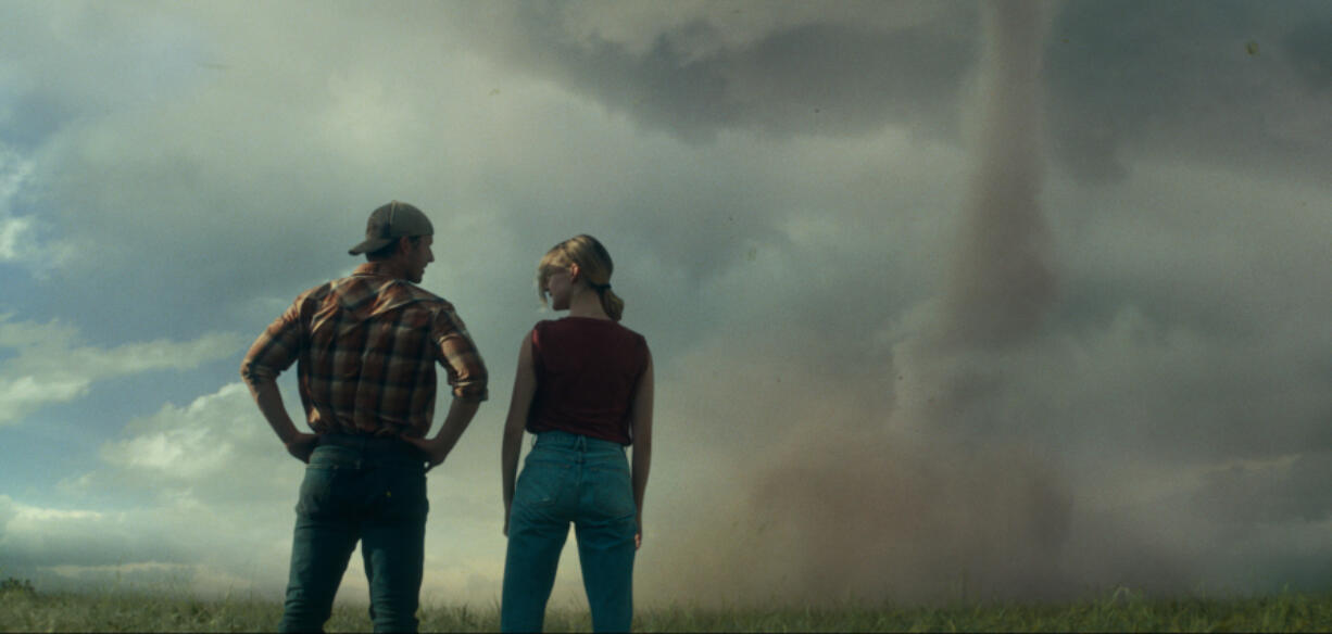 Glen Powell, left, and Daisy Edgar-Jones in &ldquo;Twisters.&rdquo; (Universal Pictures)