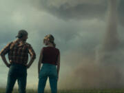 Glen Powell, left, and Daisy Edgar-Jones in &ldquo;Twisters.&rdquo; (Universal Pictures)