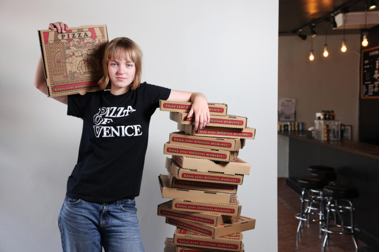 Pizza of Venice employee Sookie Orth is photographed at the pizza shop in Altadena, California, on July 12, 2024.