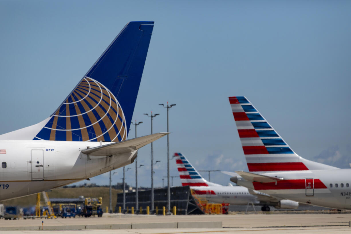 United Airlines and American Airlines jets on Sept. 9, 2021, at O&rsquo;Hare International Airport.