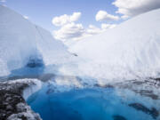 A MICA Guides tour shows the unique icy landscape of the 27-mile-long Matanuska Glacier in Alaska on July 20. Deep holes, flowing glacial streams, ice canyons and blue pools of water define this cold and beautiful landscape.