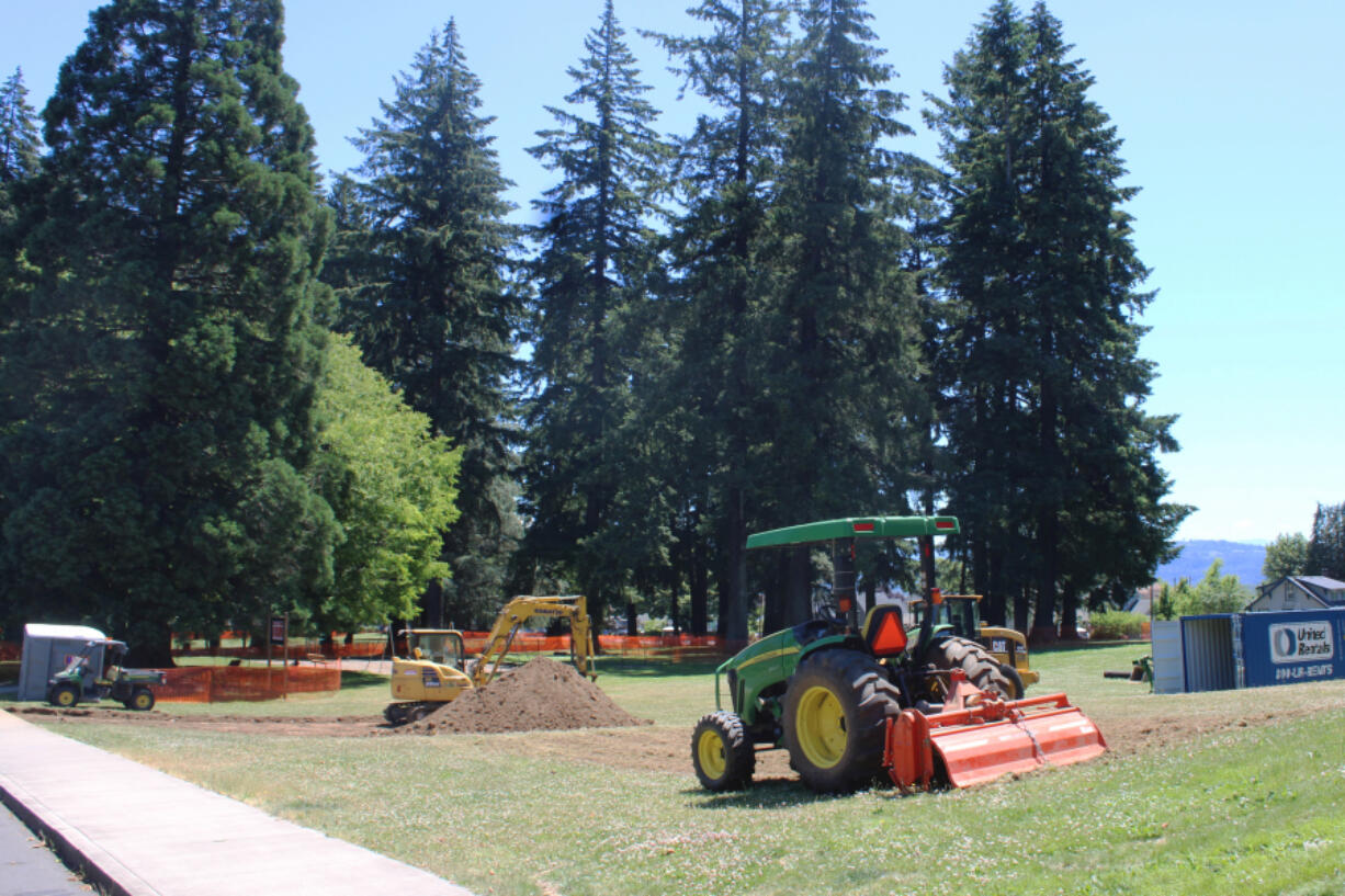 Construction crews work at Crown Park in Camas on June 24. Park impact fees, paid by new development, help fund park and recreation upgrades that will accommodate new users and a growing population.