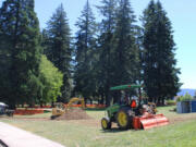 Construction crews work at Crown Park in Camas on June 24. Park impact fees, paid by new development, help fund park and recreation upgrades that will accommodate new users and a growing population.