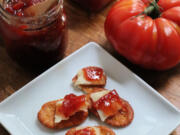 Gently spiced with cinnamon, ginger and red chili, this tomato chutney pairs great with cheese and also is a punch alternative to ketchup for burgers.