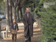 Haley Joel Osment, left, and Bruce Willis in &ldquo;The Sixth Sense.&rdquo; (Zuma Press)