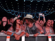 Fans cheer as Zach Bryan performs at Lincoln Financial Field on Aug. 6, 2024, in Philadelphia. Bryan took stage an hour late due to severe rain storms that had 60,000 fans rush to shelter.