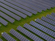 In an aerial view, solar panels are seen at MCE Solar One solar farm on April 25, 2024, in Richmond, California. California has cut back on rooftop solar incentives as the state has an estimated 47 gigawatts of solar power installed, nearly 25 percent of the state&rsquo;s electricity, that powers 13.9 million homes. On days where there is little demand for electricity, the price of electricity flattens and gigawatts of the solar generated power is curtailed.