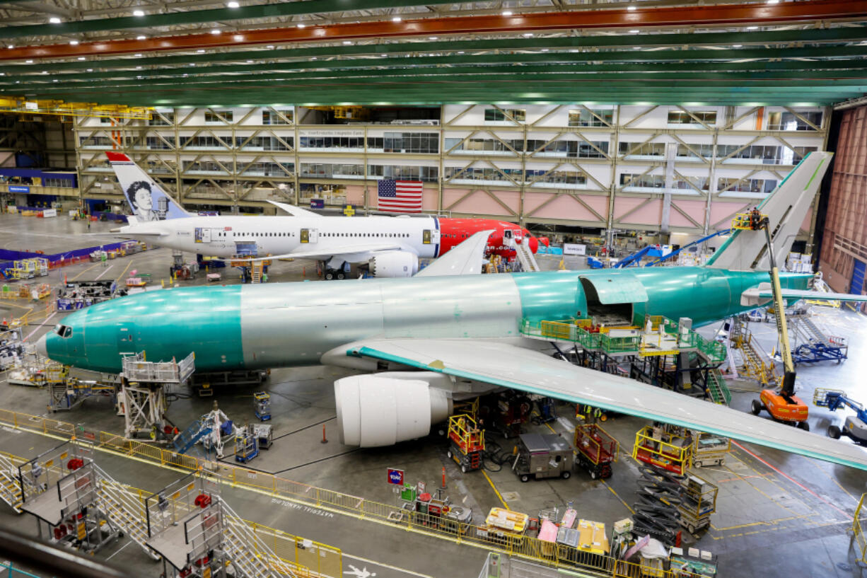 Boeing employees build 777 aircrafts under production at the Everett Production Facility on June 26, 2024 in Everett, Washington. The 777X, Boeing&#039;s latest incarnation of the popular 777 family, has received more than 500 orders, although it has not yet entered commercial service. Boeing had originally planned for the jet to enter service in January 2020. But the timeframe has been pushed back to 2025 due to certification delays. The jet still must be certified by the US Federal Aviation Administration.