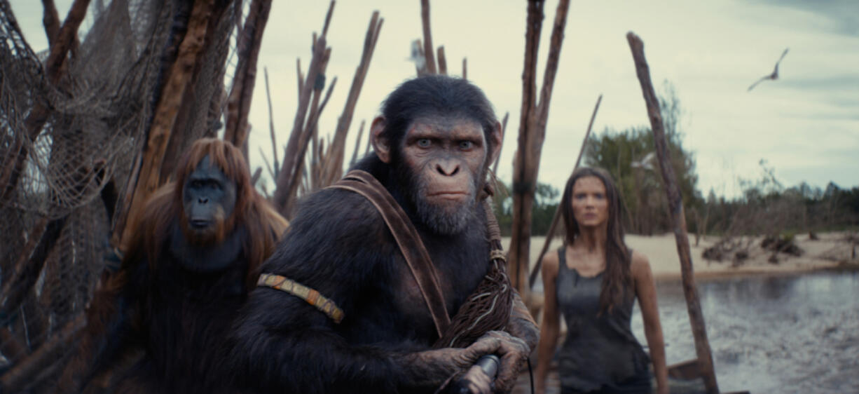 From left, Raka (played by Peter Macon), Noa (Owen Teague) and Freya Allan as Nova in 20th Century Studios&rsquo; &ldquo;Kingdom of the Planet of the Apes.&rdquo; (20th Century Studios/TNS)