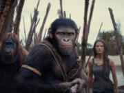 From left, Raka (played by Peter Macon), Noa (Owen Teague) and Freya Allan as Nova in 20th Century Studios&rsquo; &ldquo;Kingdom of the Planet of the Apes.&rdquo; (20th Century Studios/TNS)