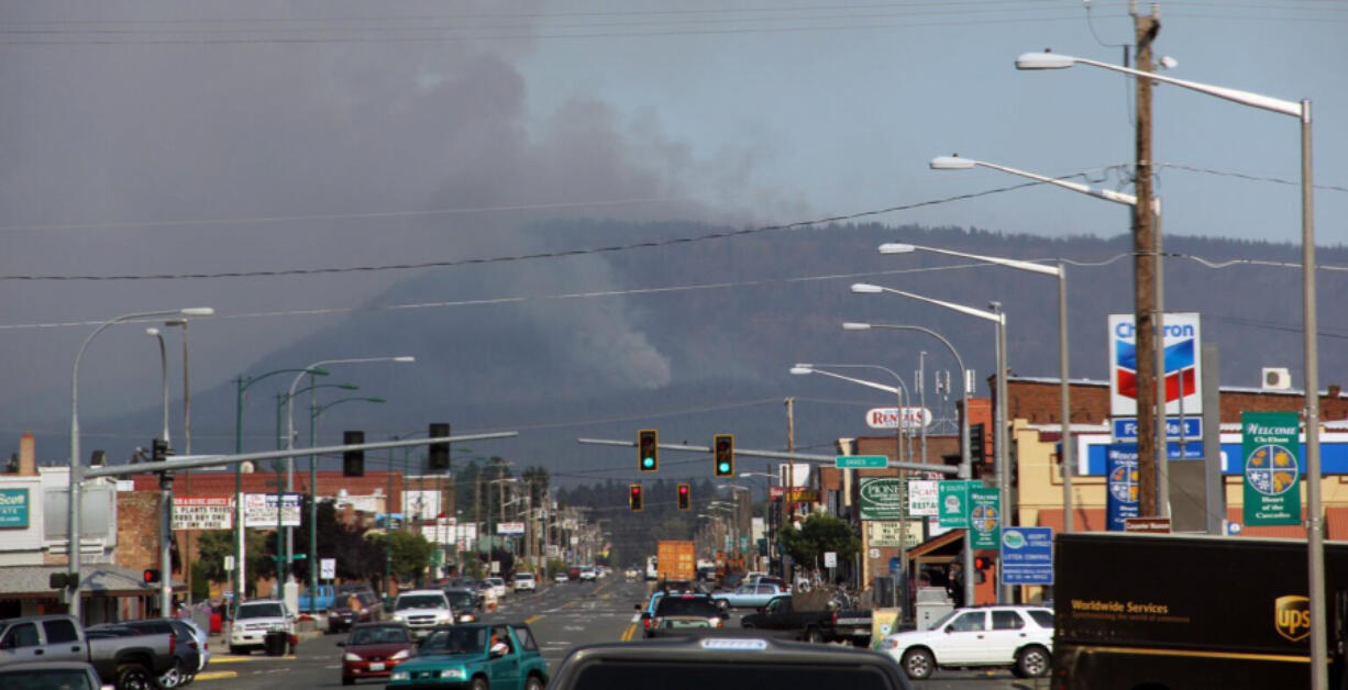 Smoke from the Taylor Bridge wildfire rises east of Cle Elum, Washington. That 2012 wildfire burned many homes between Cle Elum and Ellensburg.