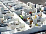 The first stage of construction of a first-of-its kind apartment building in Palm Beach County, Florida. It was built with blocks made of recycled glass, plastic and other materials that fit together like Lego pieces. A Miami company that developed the systems says it can lead to cheaper, greener buildings.