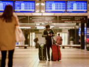 A traveler waits for a ride at Pittsburgh International Airport on Nov. 8, 2021. The Biden administration&Ccedil;&fnof;&Ugrave;s Bipartisan Infrastructure Law opened the way for the smaller, regional airport to receive a full $1.5 billion for upgrades and improvements.