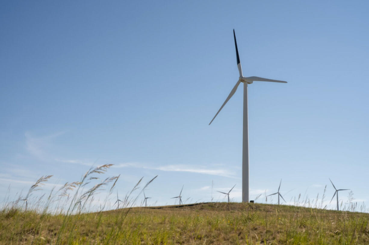 A wind turbine with one blade painted black at a PacifiCorp wind farm in Wyoming.