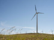 A wind turbine with one blade painted black at a PacifiCorp wind farm in Wyoming.