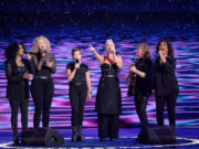 Pink, with daughter Willow and others, perform during the Democratic National Convention on Aug. 22, in Chicago, where Beyonce was falsely rumored to appear as well. (Myung J.