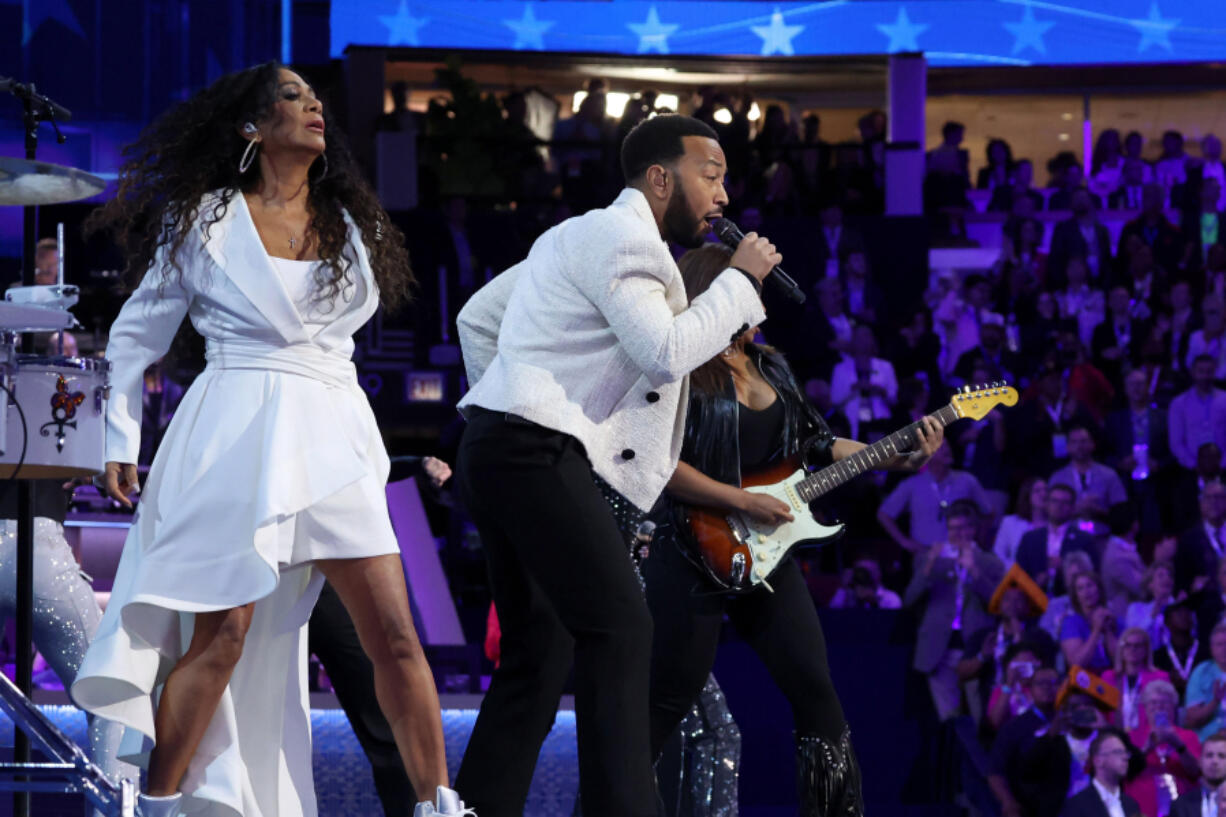 Sheila E., left, and John Legend perform Aug. 21 during the Democratic National Convention in Chicago.