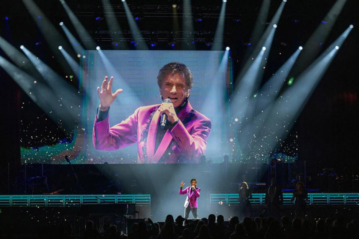 Barry Manilow performs on stage at the T-Mobile Center during a stop in Kansas City as part of The Last Concerts Tour on Aug. 25.