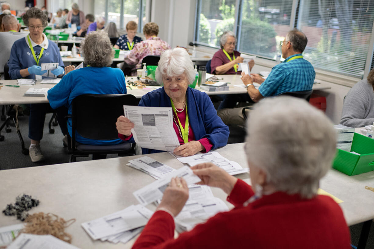 Ballots are sorted at Clark County Elections Office on Tuesday afternoon.