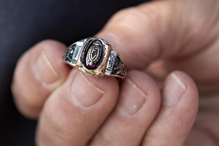 Barbara James, Fort Vancouver High School Class of 1981, holds her recovered class ring at Wintler Park last week. It had been missing for 42 years.