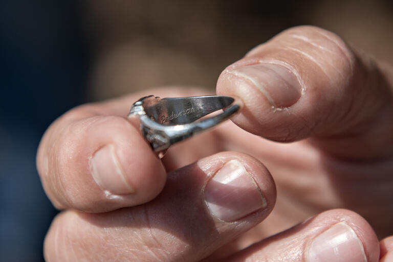 Barbara James, a member of the Fort Vancouver High School class of 1981, holds her recovered class ring that has her maiden name, Pederson, inscribed on it.