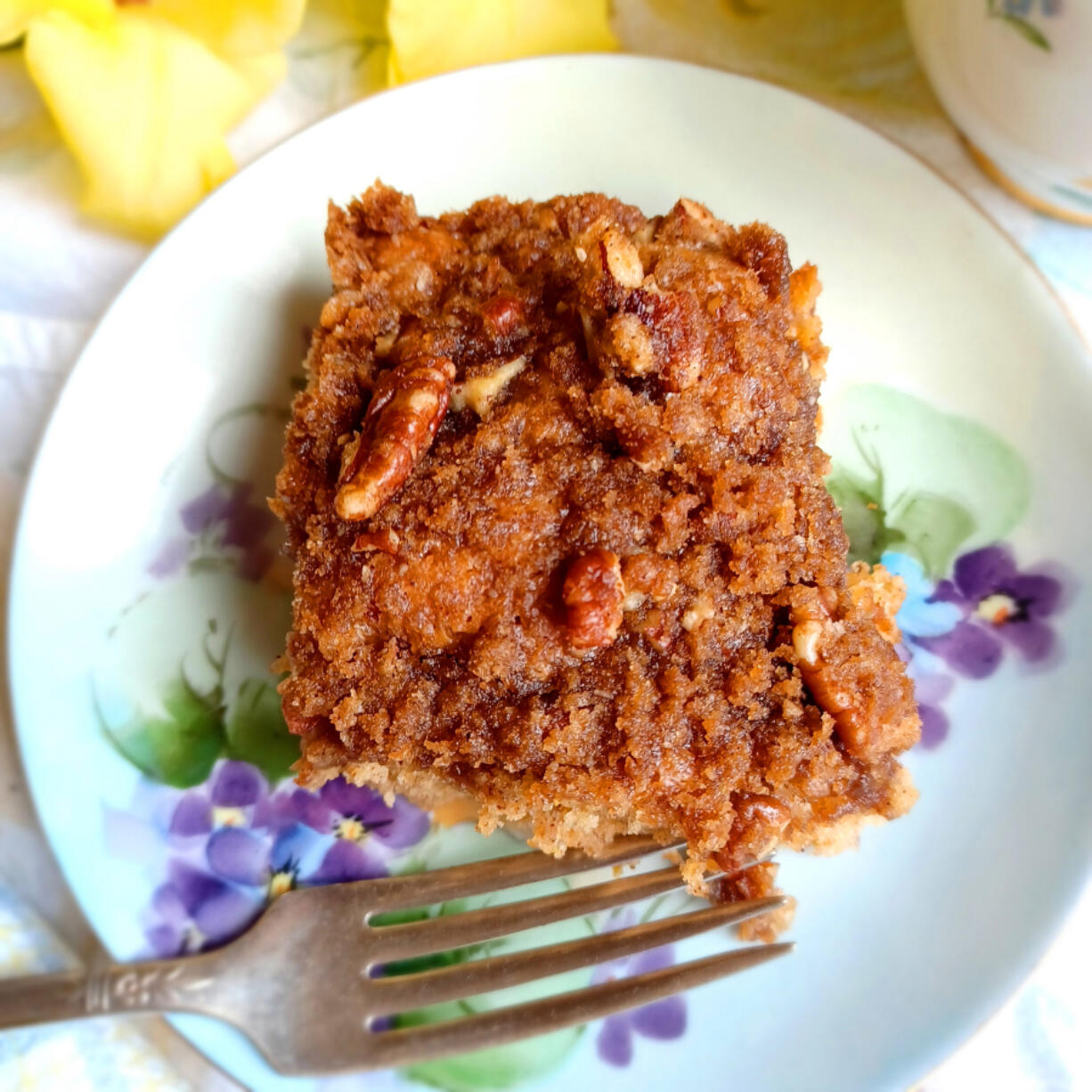 Two cups of fresh peaches and a pecan-brown sugar streusel topping make this coffee cake irresistible.