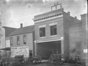 Frank Lackaff operated a saloon at 500 Washington St. in downtown Vancouver, as seen in this photo taken in about 1906. A blacksmith shop on the right is in a building that still stands. Today the site of the saloon is home to a business called REV Rides.