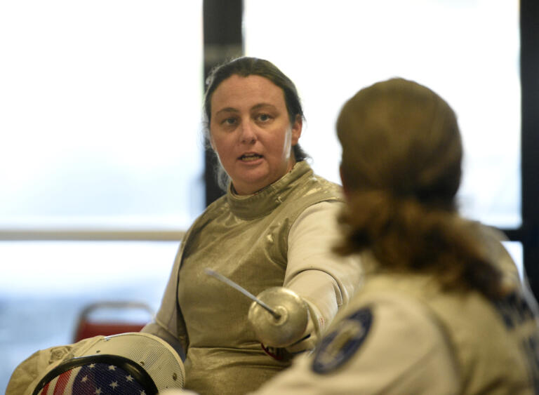 Ellen Geddes talks with Julie Grant at a Walk and Roll Tournament at Orion Fencing in Orchards on Saturday, Aug. 3, 2024, as a send-off to Geddes as she prepares to compete in wheelchair fencing at the Paralympic Games in Paris.