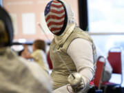 Ellen Geddes competes in a Walk and Roll Tournament at Orion Fencing in Orchards on Saturday, Aug. 3, 2024, as a send-off to her as she prepares to compete in wheelchair fencing at the Paralympic Games in Paris.