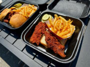 Two sliders with fries and two tenders with fries from Dave&rsquo;s Hot Chicken.